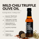 Ingredient guide for SydPlayEat Mild Chili Truffle Olive Oil, showing black truffles from Burgundy, organic extra virgin olive oil, New Mexico pepper flakes, Aleppo pepper, marjoram, and French grey salt.