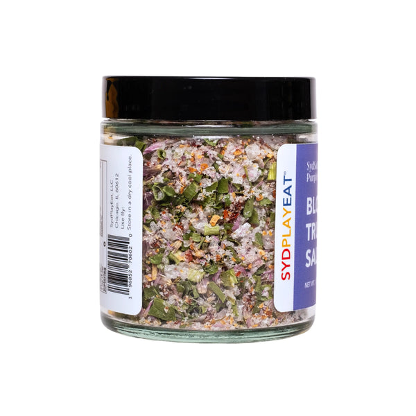 An image showing a container of gourmet blossom truffle salt.