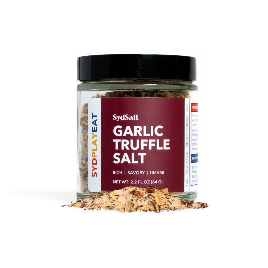 Jar of Garlic Truffle Salt with a red label on a white background