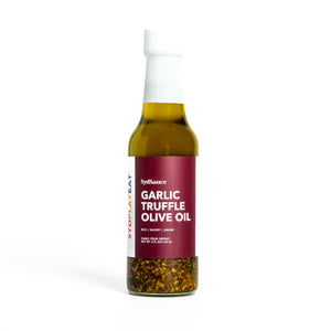 Bottle of garlic ruffle olive oil on a white background